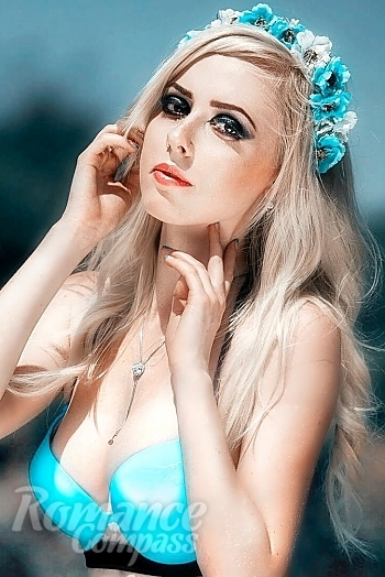 Ukrainian mail order bride Olga from Kiev with blonde hair and hazel eye color - image 1