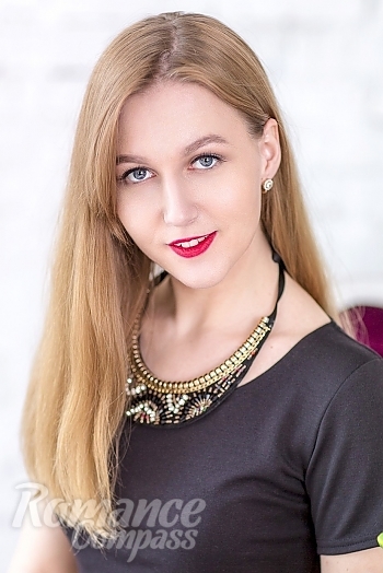 Ukrainian mail order bride Irina from Zaporozhye with light brown hair and blue eye color - image 1