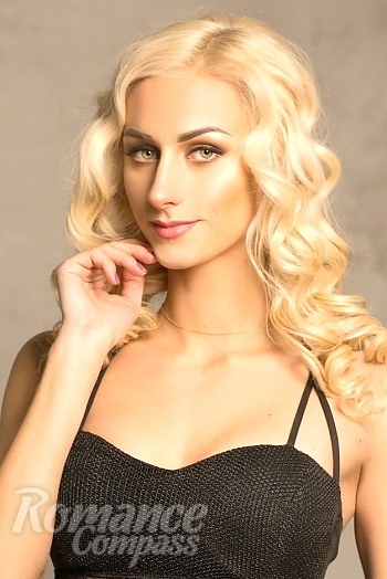 Ukrainian mail order bride Anna from Sumy with blonde hair and grey eye color - image 1