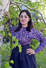 Ukrainian mail order bride Ajnura from Kherson with brunette hair and hazel eye color - image 3
