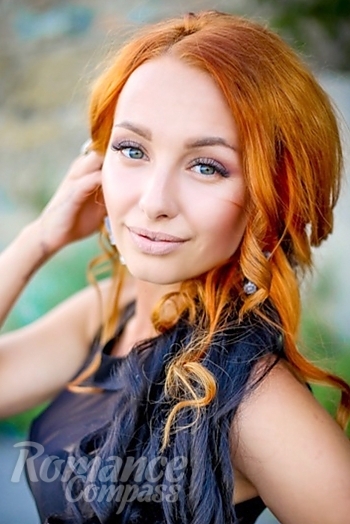 Ukrainian mail order bride Anastasia from Nikopol with red hair and grey eye color - image 1