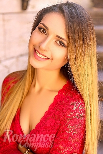 Ukrainian mail order bride Ludmila from Kiev with light brown hair and brown eye color - image 1
