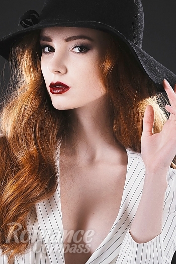 Ukrainian mail order bride Alexandra from Kiev with red hair and hazel eye color - image 1