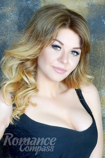 Ukrainian mail order bride Vlada from Kiev with blonde hair and grey eye color - image 1
