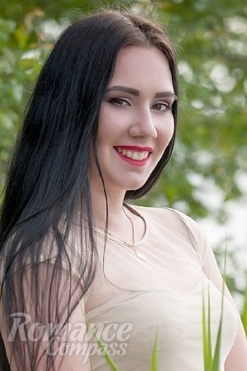 Ukrainian mail order bride Olesya from Nikolaev with black hair and hazel eye color - image 1