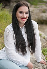 Ukrainian mail order bride Olesya from Nikolaev with black hair and hazel eye color - image 2