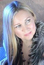 Ukrainian mail order bride Yuliya from Lugansk with blonde hair and blue eye color - image 4