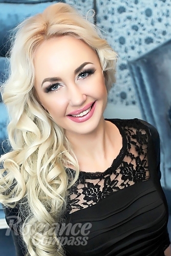 Ukrainian mail order bride Svetlana from Odessa with blonde hair and blue eye color - image 1