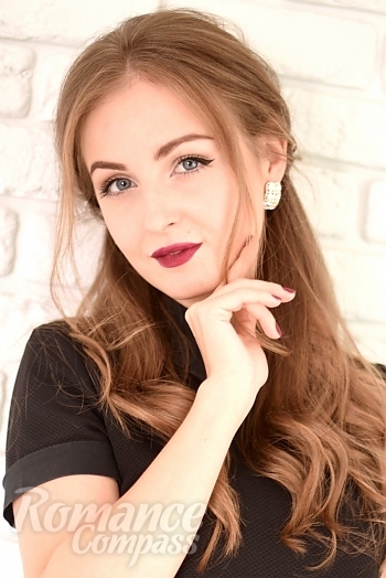 Ukrainian mail order bride Irina from Donetsk with light brown hair and blue eye color - image 1