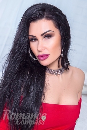 Ukrainian mail order bride Jeanne from Odessa with black hair and brown eye color - image 1