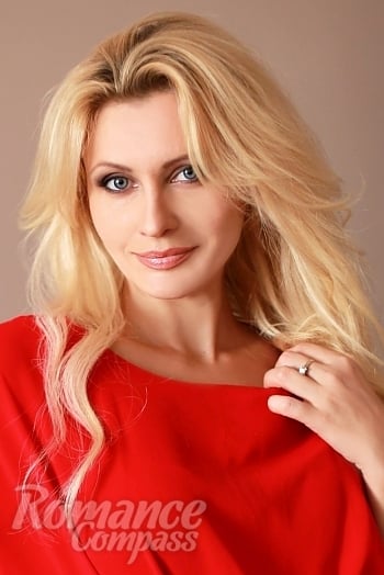 Ukrainian mail order bride Svetlana from Kiev with blonde hair and blue eye color - image 1