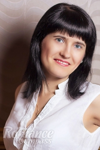 Ukrainian mail order bride Victoria from Kiev with brunette hair and grey eye color - image 1