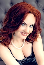 Ukrainian mail order bride Anna from Kiev with red hair and green eye color - image 2
