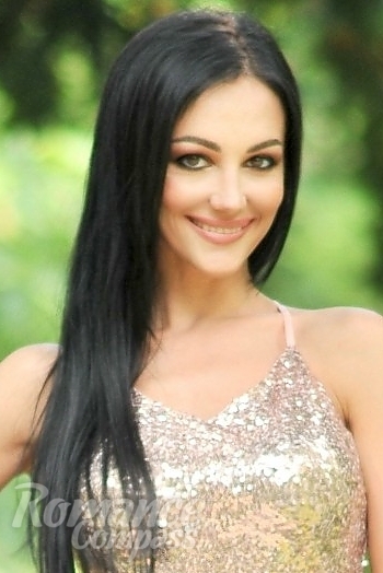Ukrainian mail order bride Valeria from Odessa with black hair and green eye color - image 1