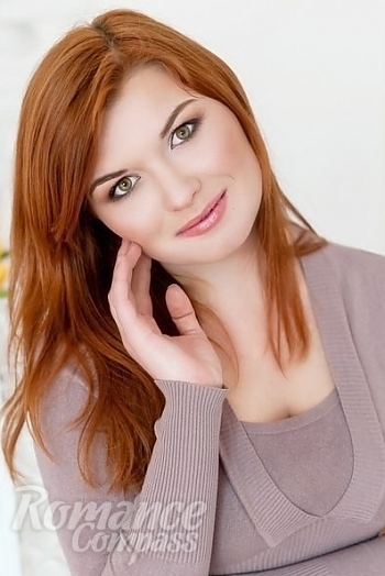 Ukrainian mail order bride Elena from Nikolaev with red hair and green eye color - image 1