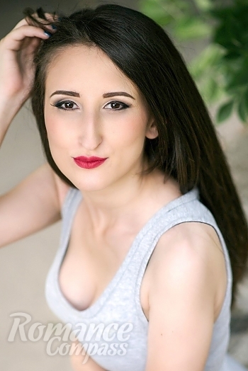 Ukrainian mail order bride Kseniya from Nikolaev with brunette hair and brown eye color - image 1