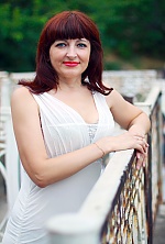 Ukrainian mail order bride Lyudmila from Nikolaev with brunette hair and blue eye color - image 7