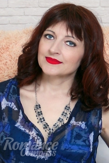 Ukrainian mail order bride Lyudmila from Nikolaev with brunette hair and blue eye color - image 1
