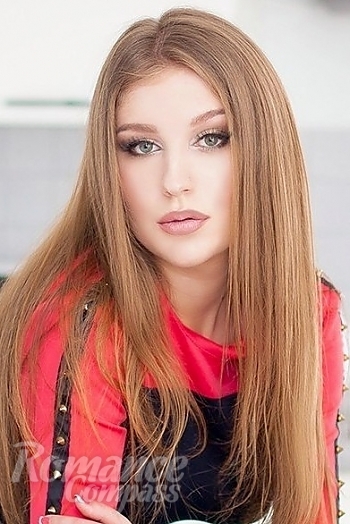 Ukrainian mail order bride Anastasia from Saint Petersburg with light brown hair and green eye color - image 1