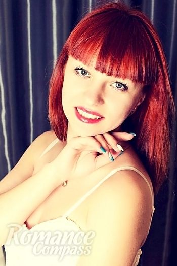 Ukrainian mail order bride Marina from Lugansk with red hair and green eye color - image 1