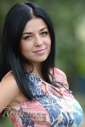 Ukrainian mail order bride Anna from Lugansk with black hair and green eye color - image 1