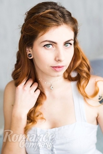Ukrainian mail order bride Tatiana from Nikolaev with auburn hair and green eye color - image 1