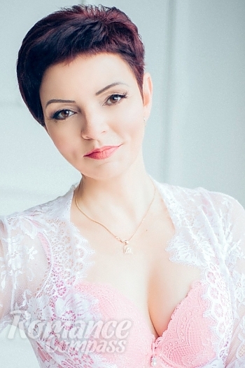 Ukrainian mail order bride Natalia from Huliaipole with red hair and brown eye color - image 1