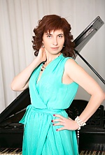 Ukrainian mail order bride Irina from Chernihiv with red hair and green eye color - image 3