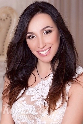 Ukrainian mail order bride Tatiana from Kharkiv with black hair and brown eye color - image 1
