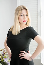 Ukrainian mail order bride Anna from Kharkiv with light brown hair and blue eye color - image 22