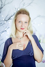 Ukrainian mail order bride Ruslana from Novovolynsk with blonde hair and blue eye color - image 8