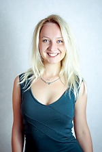 Ukrainian mail order bride Ruslana from Novovolynsk with blonde hair and blue eye color - image 4
