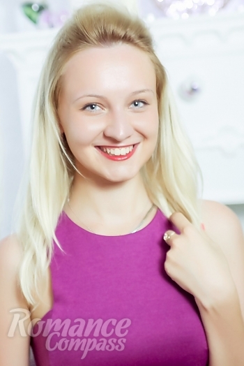 Ukrainian mail order bride Ruslana from Novovolynsk with blonde hair and blue eye color - image 1