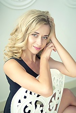 Ukrainian mail order bride Anastasia from Chernovtsy with blonde hair and green eye color - image 3