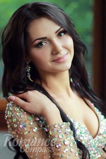 Ukrainian mail order bride Yana from Odessa with black hair and brown eye color - image 1