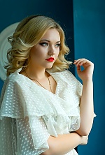 Ukrainian mail order bride Anastasia from Kherson with blonde hair and green eye color - image 11