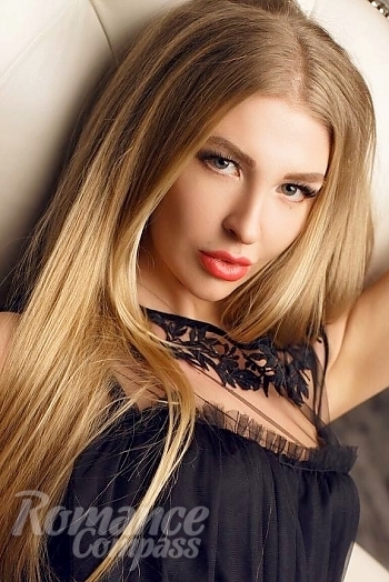 Ukrainian mail order bride Yuliia from Kyiv with blonde hair and blue eye color - image 1