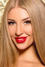Ukrainian mail order bride Yuliia from Kyiv with blonde hair and blue eye color - image 6