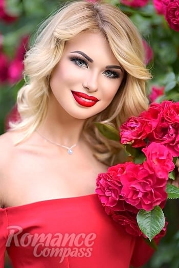 Ukrainian mail order bride Olga from Nikolaev with blonde hair and green eye color - image 1