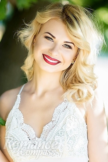 Ukrainian mail order bride Olga from Nikolaev with blonde hair and green eye color - image 1