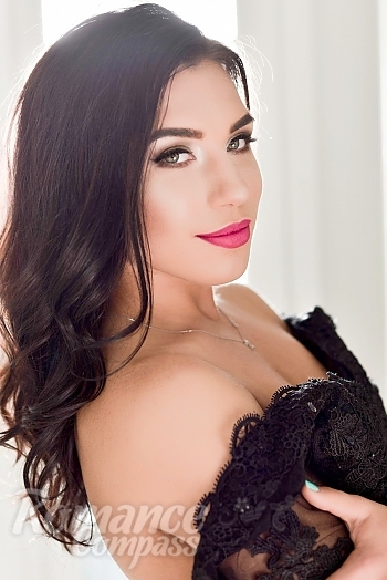 Ukrainian mail order bride Anna from Losova with black hair and green eye color - image 1