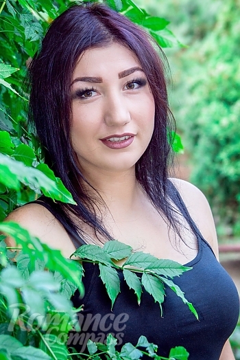 Ukrainian mail order bride Svetlana from Berdyansk with black hair and brown eye color - image 1
