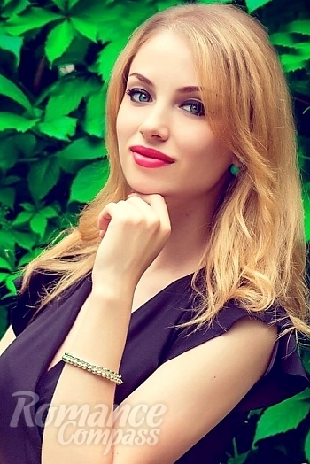 Ukrainian mail order bride Yana from Lugansk with blonde hair and blue eye color - image 1