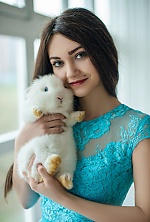 Ukrainian mail order bride Kris from Gomel with brunette hair and green eye color - image 4