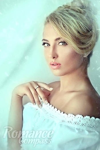 Ukrainian mail order bride Veronika from Kharkov with blonde hair and blue eye color - image 1