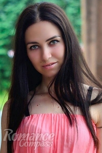 Ukrainian mail order bride Ksenia from Donetsk with brunette hair and green eye color - image 1