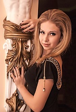 Ukrainian mail order bride Alina from Poltava with light brown hair and green eye color - image 3