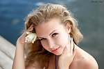 Ukrainian mail order bride Alina from Poltava with light brown hair and green eye color - image 8