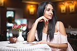 Ukrainian mail order bride Julia from Odessa with black hair and green eye color - image 3