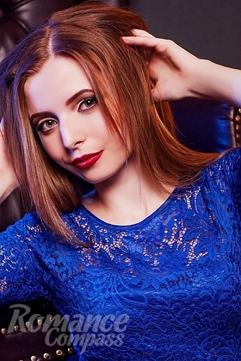 Ukrainian mail order bride Victoriya from Lviv with light brown hair and blue eye color - image 1
